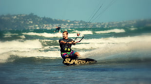 black and brown Slingshot wakeboard, men, surfing, beach, waves