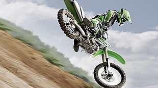 green and white dirt bike, motorcycle, vehicle, helmet, sport 