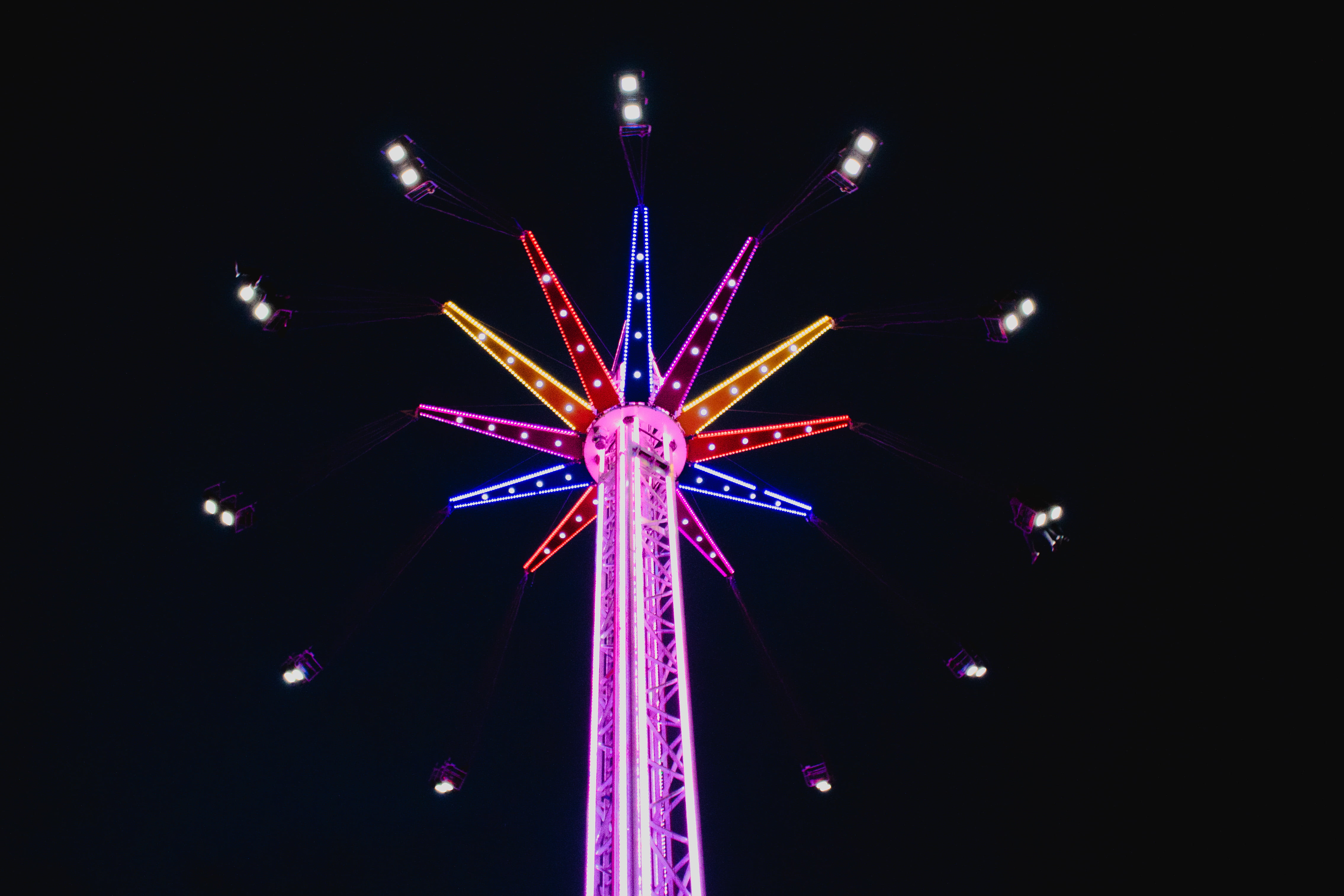 pink and multicolored lighted ferris wheel
