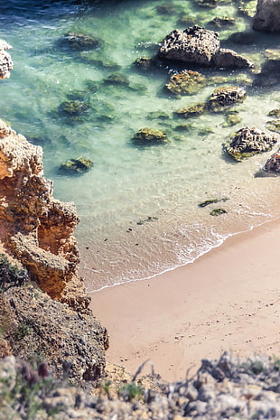 brown stone lot, beach, Algarve (Portugal), rocks, sand HD wallpaper