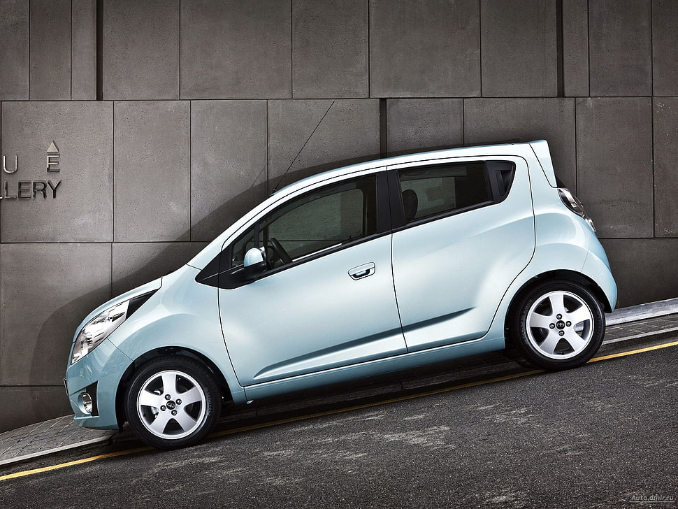 silver 3-door hatchback on gray road path HD wallpaper