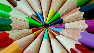 assorted color pencil forming circle in macro shot