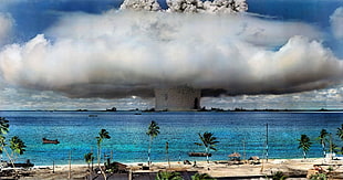 explosion in the middle of ocean during daytime HD wallpaper
