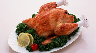 cooked chicken on white ceramic tray