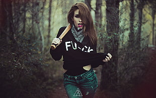 women's black and white long-sleeved shirt, women, baseball bats, torn jeans, forest