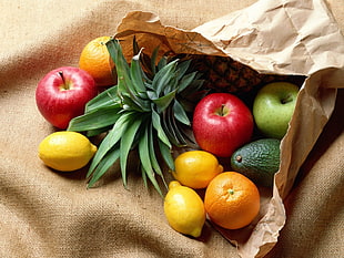 assorted fruits on brown paper bag