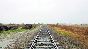photo of gray railway