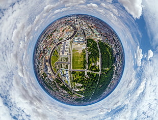little planet photography of cityscape during daytime, panoramic sphere