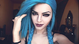 woman in blue hair and black camisole