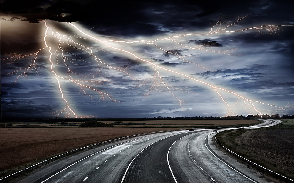 grey road with lightning on the background digital wallpaper HD wallpaper