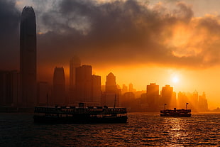 silhouette photo of boat, Hong Kong, cityscape, sunset, stacked