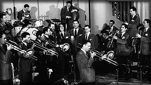 grayscale photo of men orchestra