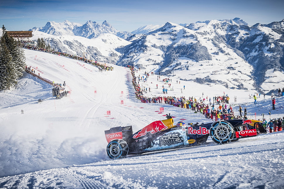 Redbull racing snow car near people on snow mountain HD wallpaper