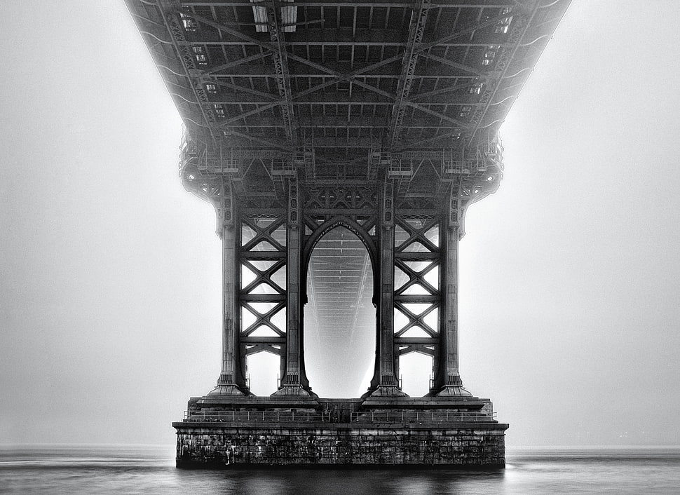 bottom view of bridge in grayscale shot HD wallpaper