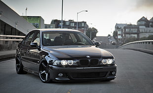 black BMW sedan, E 39