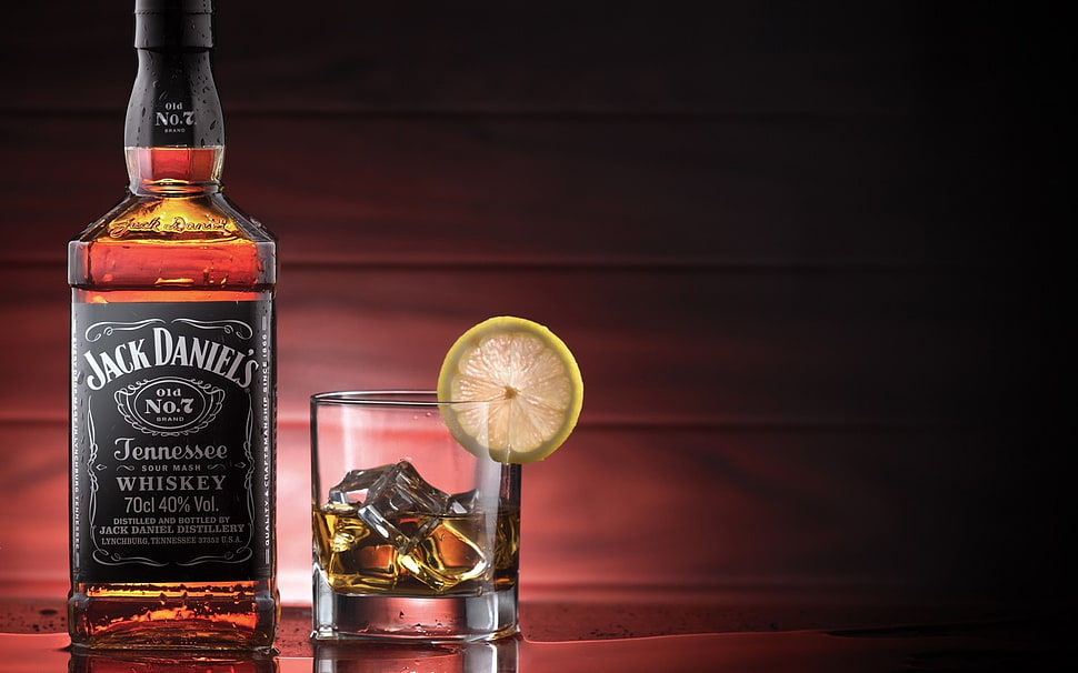 Jack Daniels bottle with shot glass HD wallpaper