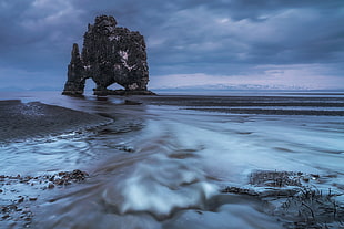 time lapse photo of rock formation on sea during daytime, iceland HD wallpaper