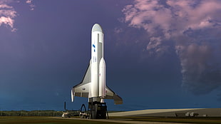 white and gray space shuttle on standby