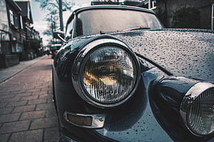close up photography of classic car headlamp