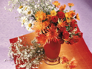 red, white, and orange flowers