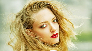 selective focus photography of woman with blonde hair and red lipstick