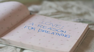 Love a reason for breathing text in white and beige paper HD wallpaper