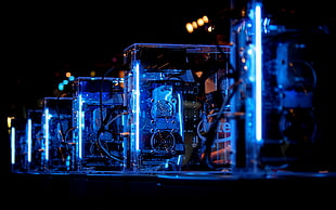 several clear-and-blue computer towers