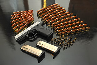 black and brown wooden nesting table, gun, ammunition, pistol, weapon