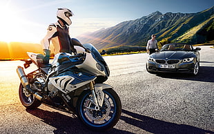 man standing beside sports bike and sports car during daytime HD wallpaper