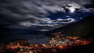 gray and blue clouds, lake, town, night