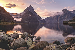 stones, body of water and mountain, Milford Sound, New Zealand, rock, lake HD wallpaper
