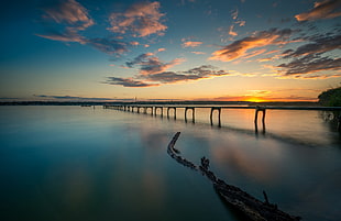 black bridge in the sea, clouds, bridge HD wallpaper