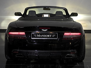 black Aston Martin Mansory HD wallpaper