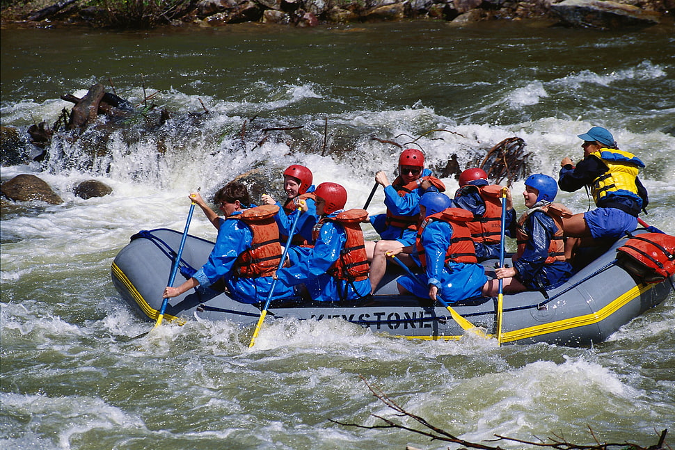 people riding on gray and yellow inflatable raft HD wallpaper