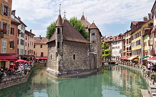brown concrete house, France, canal, Annecy HD wallpaper