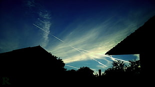 silhouette of houses under clear sky during daytime, sky, clouds