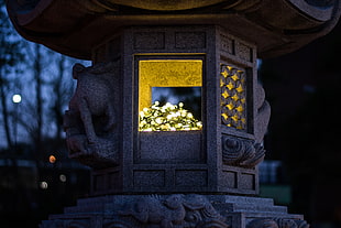 brown wooden lantern lamp