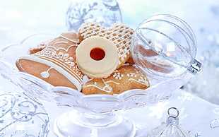 cookies on clear glass footed bowl