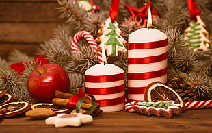 two red-and-white pillar candles, Christmas, candles, treats, apples HD wallpaper