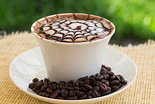 Coffee Bean on top of white ceramic plate HD wallpaper