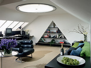 triangular black and white 4-layered shelf on wall near sofa and desk HD wallpaper
