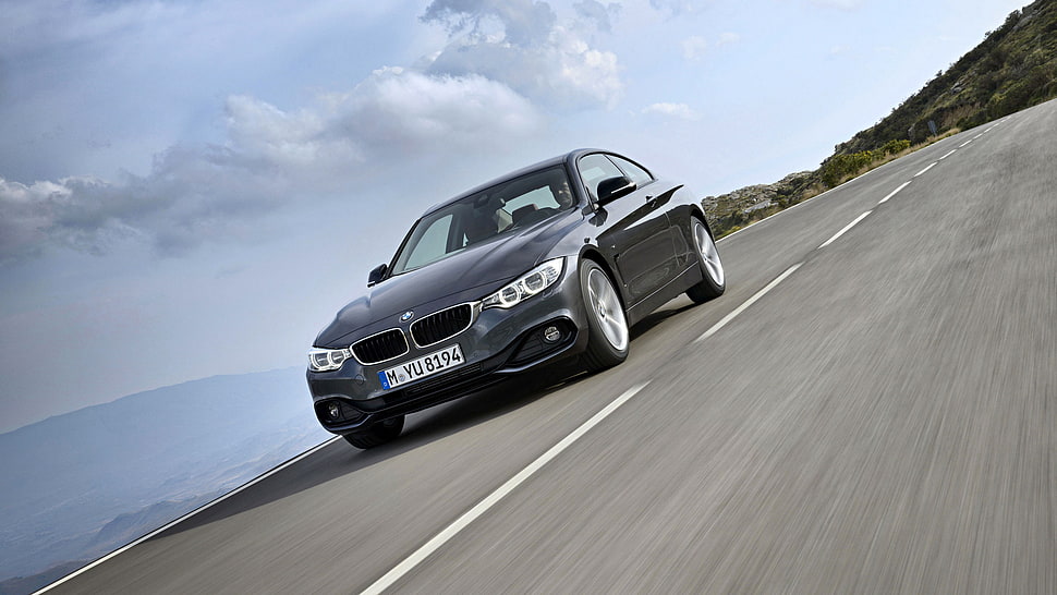 black BMW sedan HD wallpaper