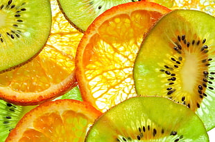 sliced kiwi and orange fruits