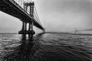 grayscale photograph of Brooklyn Bridge