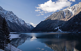 panoramic photography of mountain coated snow and lake during daytime HD wallpaper