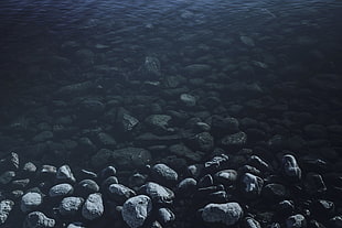black stone fragment lot, rock, water
