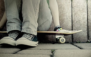 white-and-black lace-up low-top sneakers, skateboarding