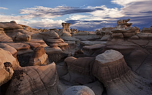 rock formations under white clouds