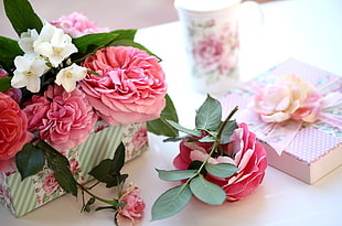 pink and white flowers on boxes