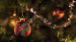 red and green Christmas bauble HD wallpaper